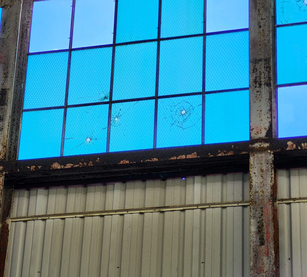 Hangar 79 Bullet Holes